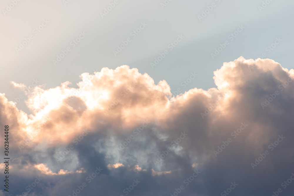 Beautiful rain clouds close-up before sunset. Cumulus clouds close up