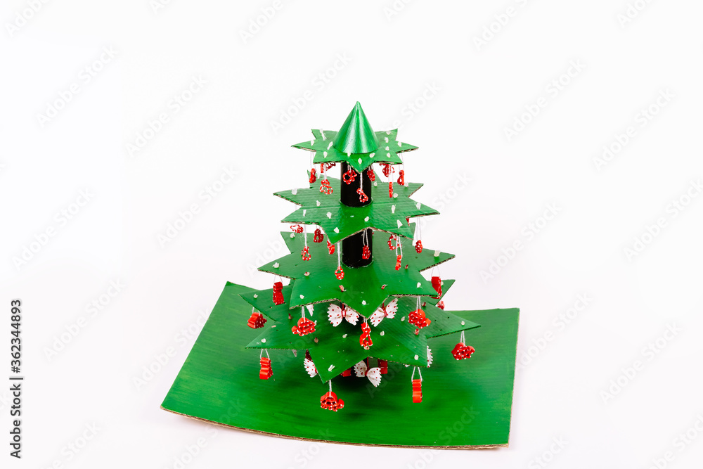 Step by step instruction how to make Christmas tree. Using glue we connect the star tiers decorated with pasta to each other with pieces of tube from paper towels and glue on a cardboard stand Step by step instruction how to make Christmas tree. Using glue we connect the star tiers decorated with pasta to each other with pieces of tube from paper towels and glue on a cardboard stand