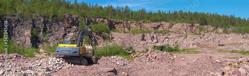 Panorama of the old quartzite quarry on a sunny June day. Shoksha, Karelia photo