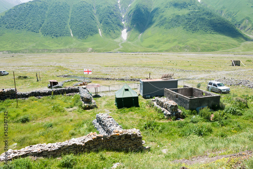 Georgian military check point on Ruins of Zakagori fortress at Truso valley near Caucasus mountain. a famous Historic site in Kazbegi, Mtskheta-Mtianeti, Georgia. photo