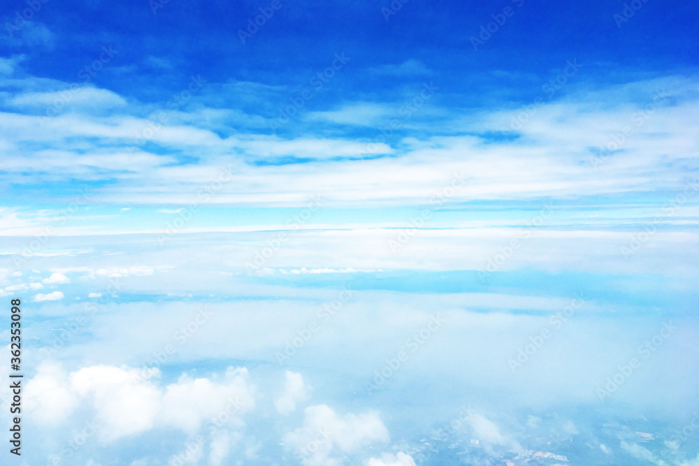 high sky above cloud background is take a photo from window of plane