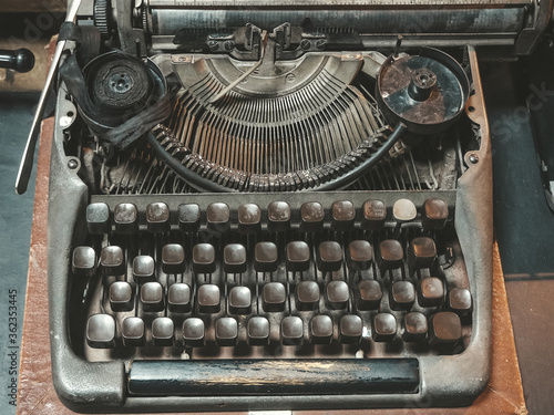 Old worn and corroded Soviet typewriter with keys without letters