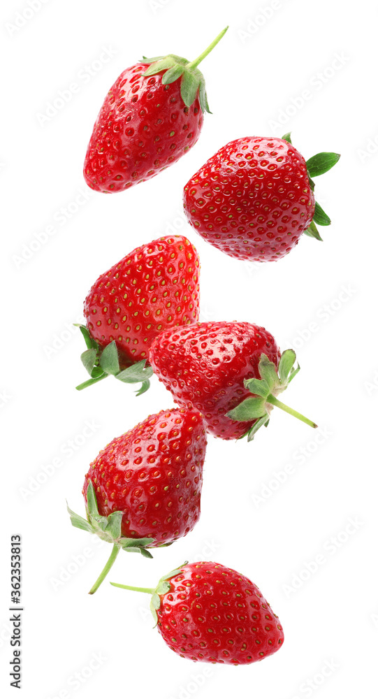 Set with ripe strawberries falling on white background Set with ripe strawberries falling on white background