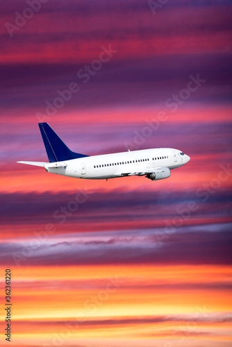 airplane on sunset background. Passenger airliner. Commercial aircraft. Private jet
