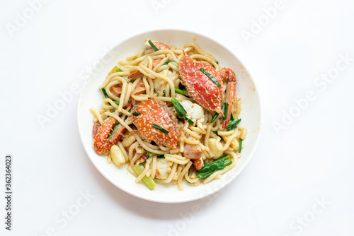 Fried noodles with sea crab on the plate