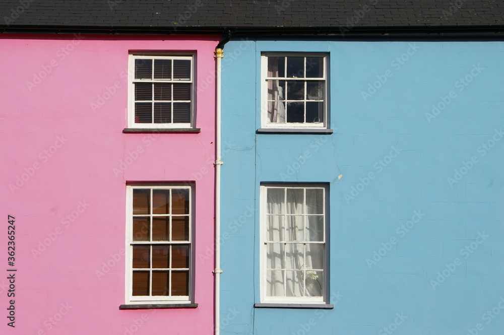 Blue house and Pink house symmetry, Wales UK. Blue house and Pink house symmetry, Wales UK.