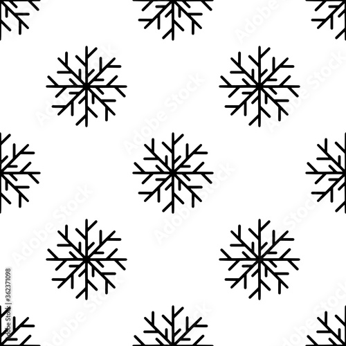 Seamless pattern made from doodle abstract snowflakes. Isolated on white background. Vector stock illustration.