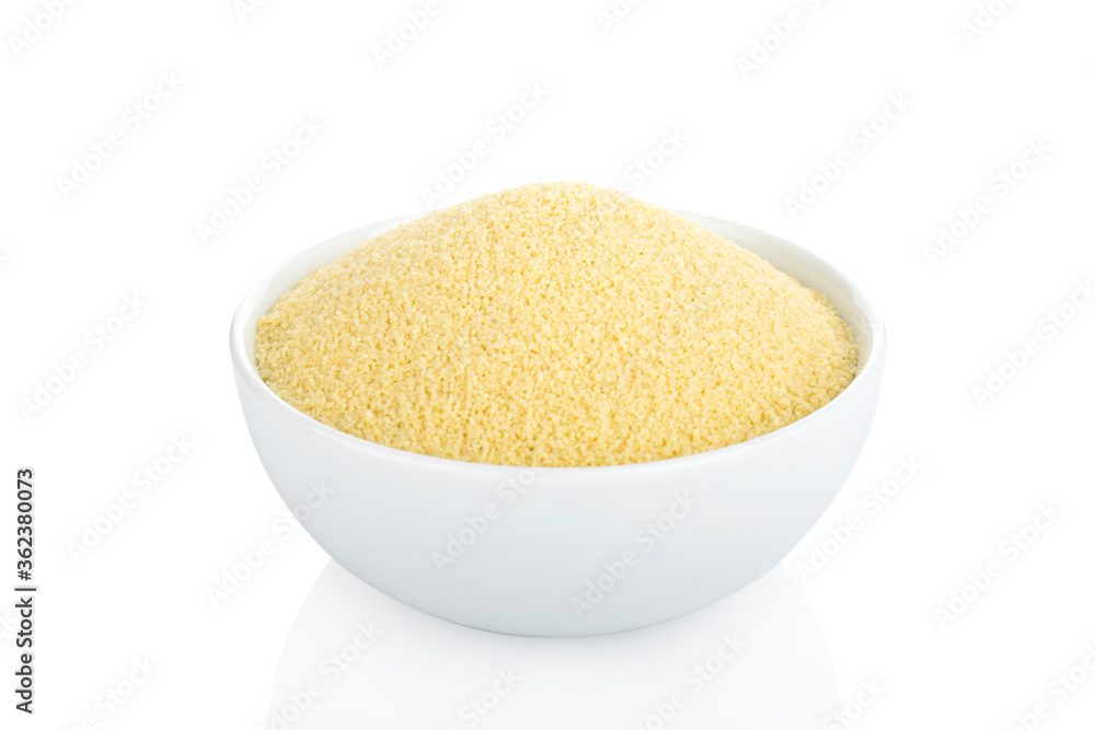 Couscous. Raw couscous in white bowl, on white background (Tr- kuskus)
Couscous. Raw couscous in white bowl, on white background (Tr- kuskus)
