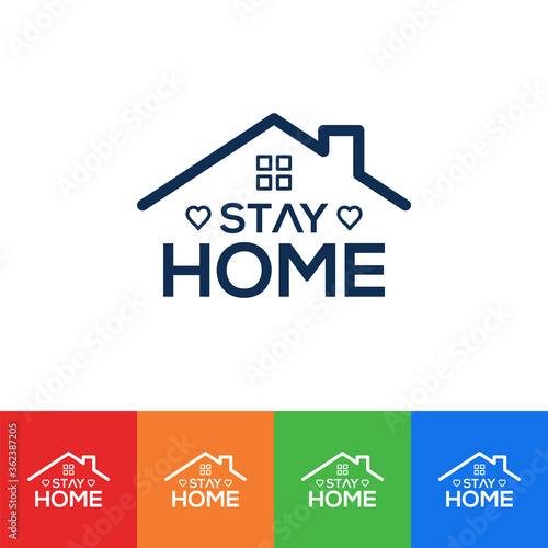 Stay At Home Text Under House Roof.