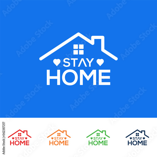 Stay At Home Text Under House Roof.