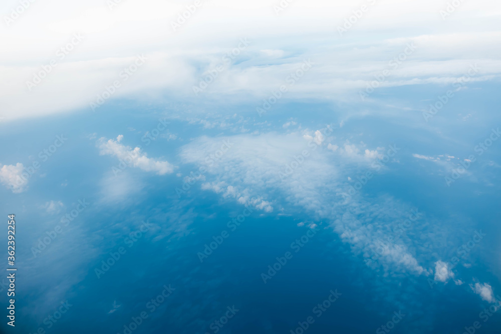 Cloud and blue sky from the airplane window