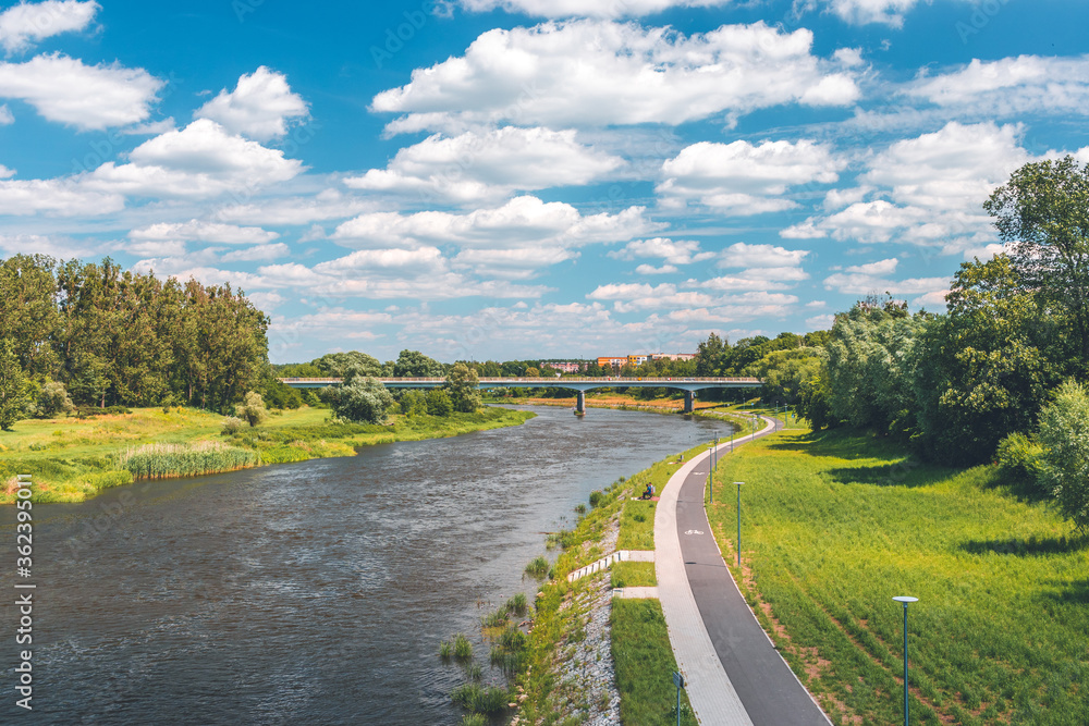 Sidewalk by the river in Wronki, POland