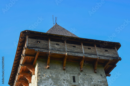 Obraz na płótnie HUMORULUI MONASTERY, BUCOVINA, ROMANIA, EUROPE, SPRING 2018. Medieval stone and wood tower of the Orthodox Humor Monastery. w salonie
