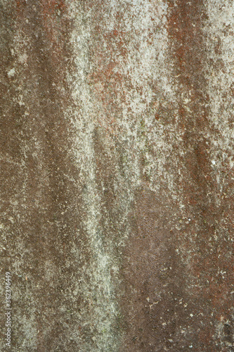 Natural rustic pattern and texture formed on an old slab of stone. Background texture. 