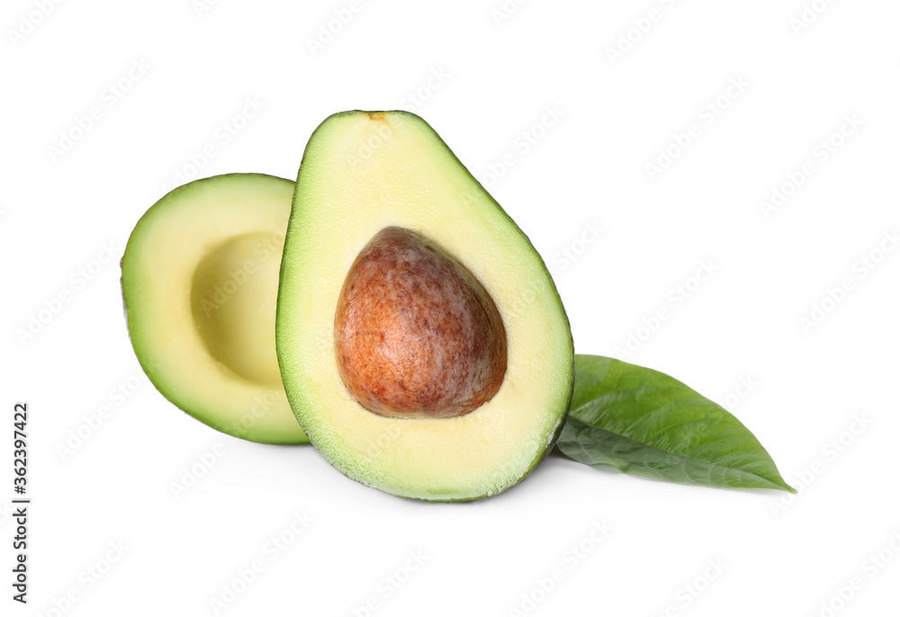 Halves of ripe avocado isolated on white