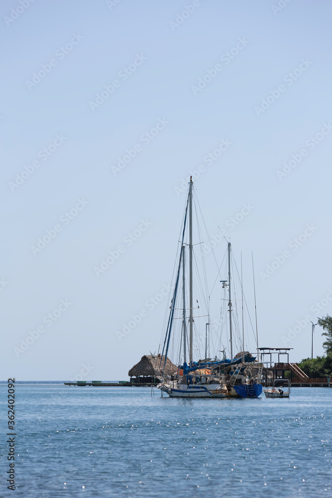 Fototapeta premium Sailboat on a Caribbean Coast