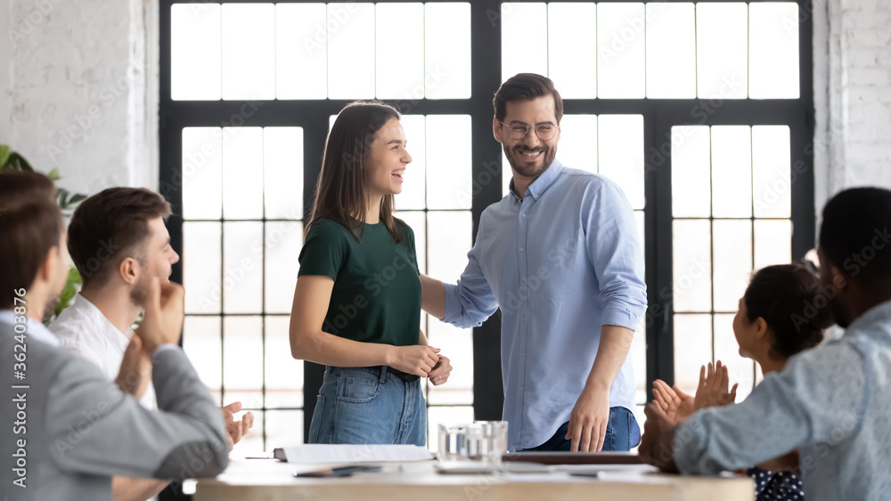 © fizkes - Accomplish seminar corporate training collective members gained knowledge express respect and gratitude clap hands thanking coach female trainer. Promoted employee receive congrats from company staff © fizkes - Accomplish seminar corporate training collective members gained knowledge express respect and gratitude clap hands thanking coach female trainer. Promoted employee receive congrats from company staff