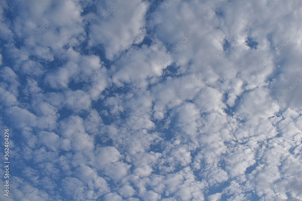 Lots of small clouds on a blue sky. Lots of small clouds on a blue sky.