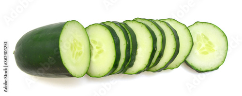 Cucumber and slices isolated over white background.