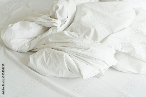 The hotel, White towel on bed in guest room for customer.Modern interior bedroom