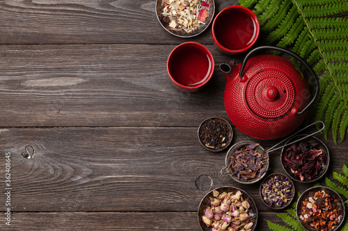 Various herbal tea, teapot and cup