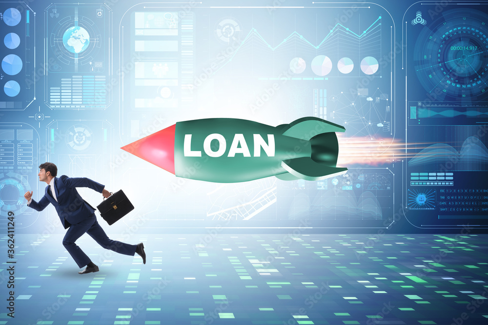 Concept of loan and debt with businessman chased by rocket Concept of loan and debt with businessman chased by rocket