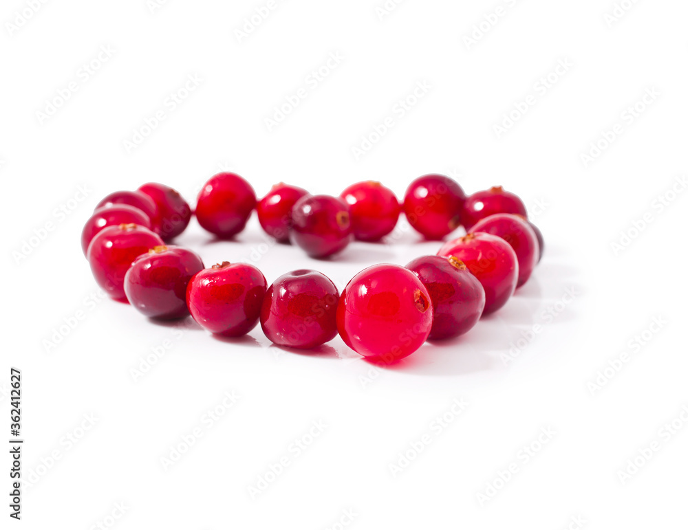 Heart made of cranberries isolated on a white background. Heart made of cranberries isolated on a white background.