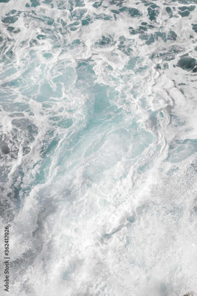 Wall mural on the marine theme. Seascape for the interior. White sea foam. The turquoise color of the waves. Stormy Bay of Biscay. The texture of the waves. Spray and the power of the sea. Wall mural on the marine theme. Seascape for the interior. White sea foam. The turquoise color of the waves. Stormy Bay of Biscay. The texture of the waves. Spray and the power of the sea.