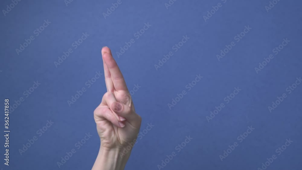 Close up of caucasian hand showing peace gesture, friendliness. Close up of caucasian hand showing peace gesture, friendliness.