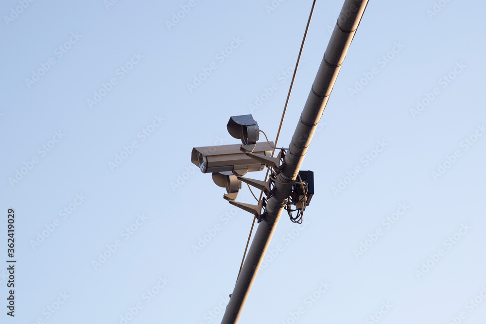 Tracking cameras installed in the city on the road. Tracking cameras installed in the city on the road.