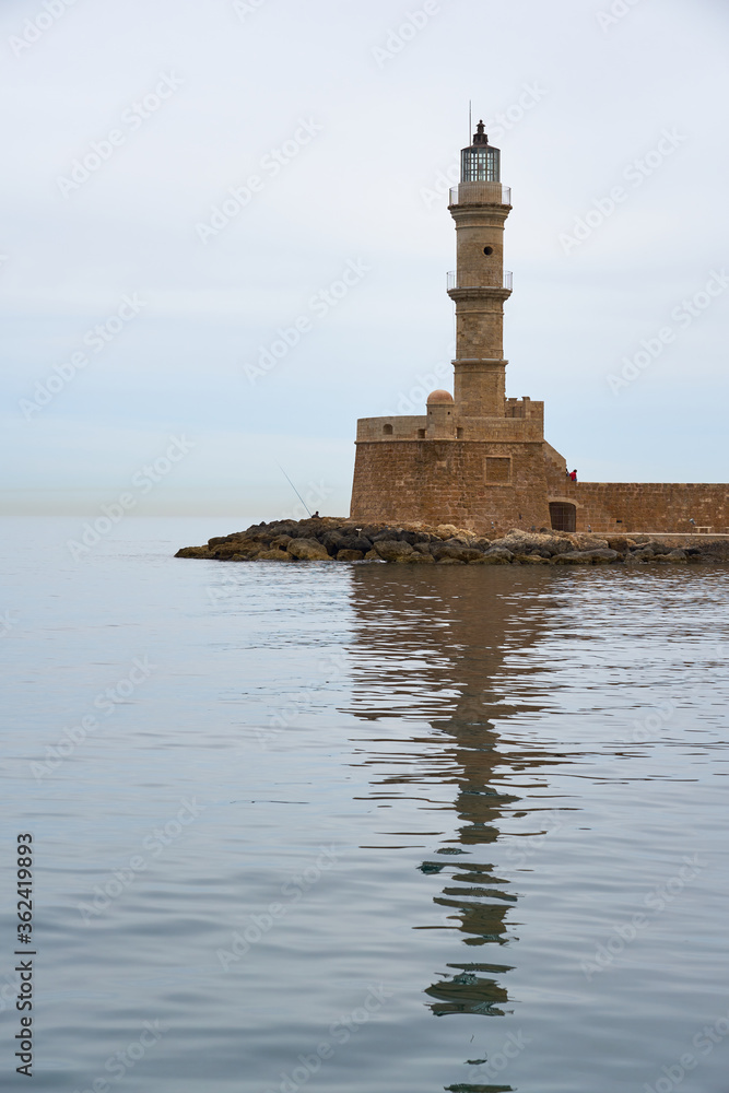 The lighthouse in Chania, Crete against foggy Mediterranean Sea.