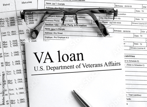Paper with text VA Loan U.S. Department of Veterans Affairs on a table photo
