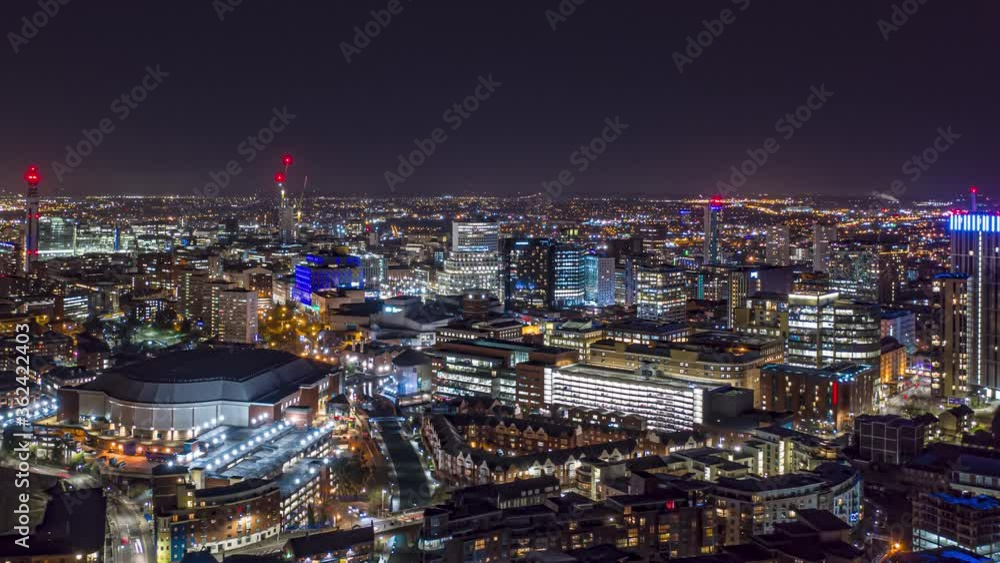 Aerial night time hyperlapse of Birmingham city centre with aircraft in the distance Aerial night time hyperlapse of Birmingham city centre with aircraft in the distance