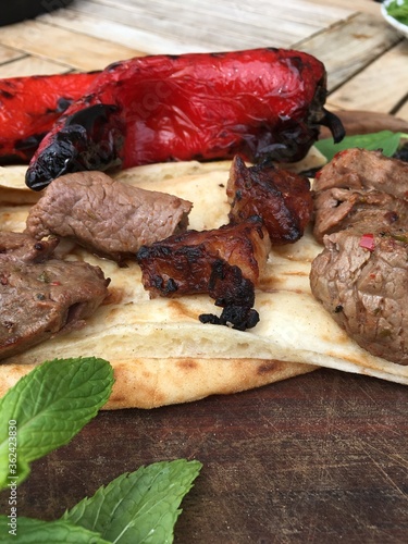 Lamb kebap Turkish food with red pepper and bread