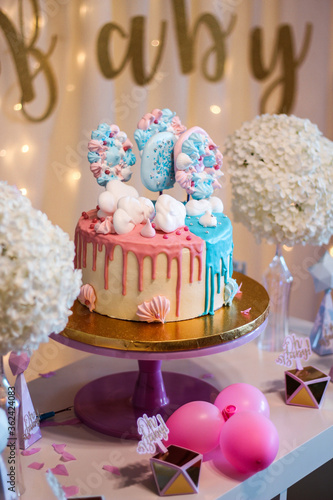 Gender reveal party cake and decorations