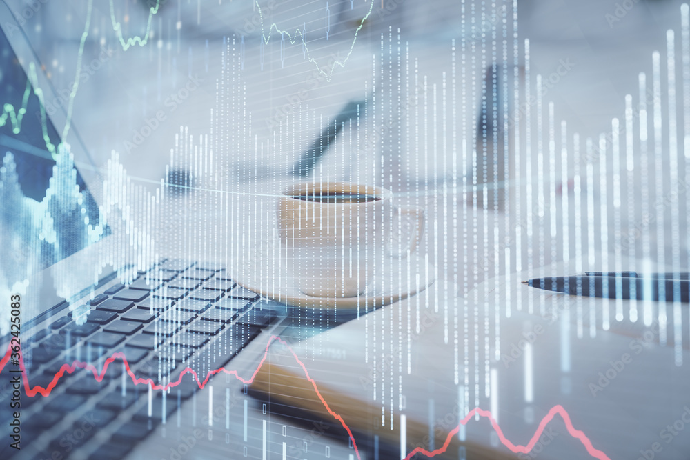Double exposure of financial chart drawing and desktop with coffee and items on table background. Concept of forex market trading Double exposure of financial chart drawing and desktop with coffee and items on table background. Concept of forex market trading
