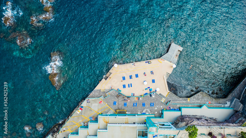 Aerial top view of public swimming pools at Barreirinha in Madeira Island, Portugal. photo