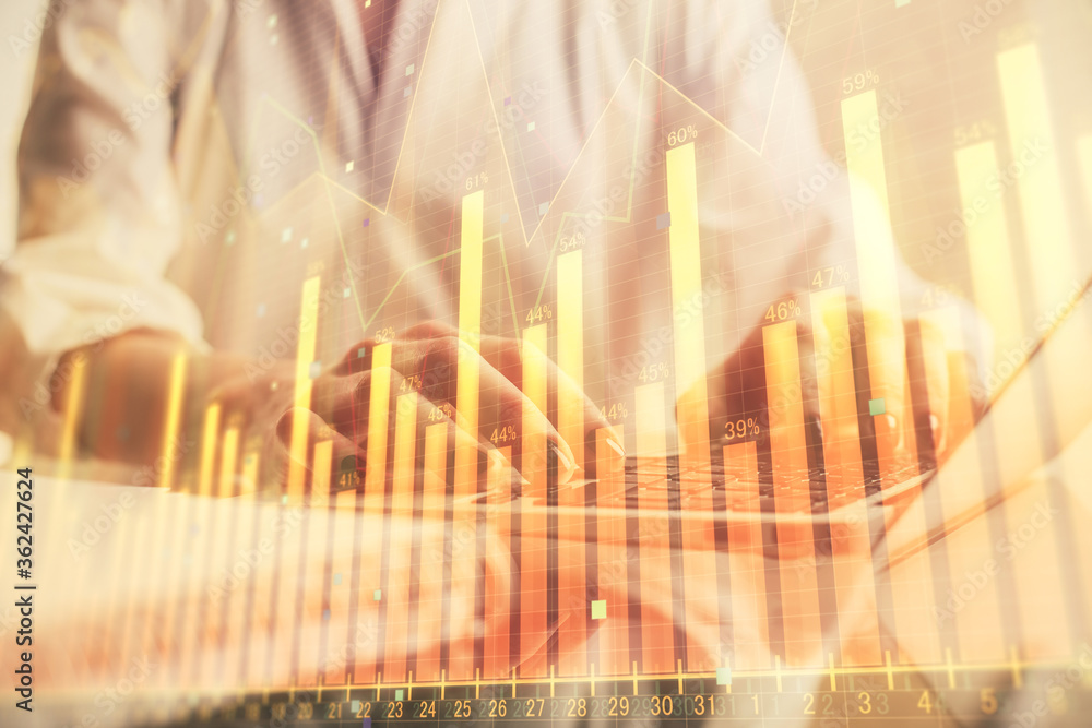 Double exposure of woman hands typing on computer and forex chart hologram drawing. Stock market invest concept. Double exposure of woman hands typing on computer and forex chart hologram drawing. Stock market invest concept.