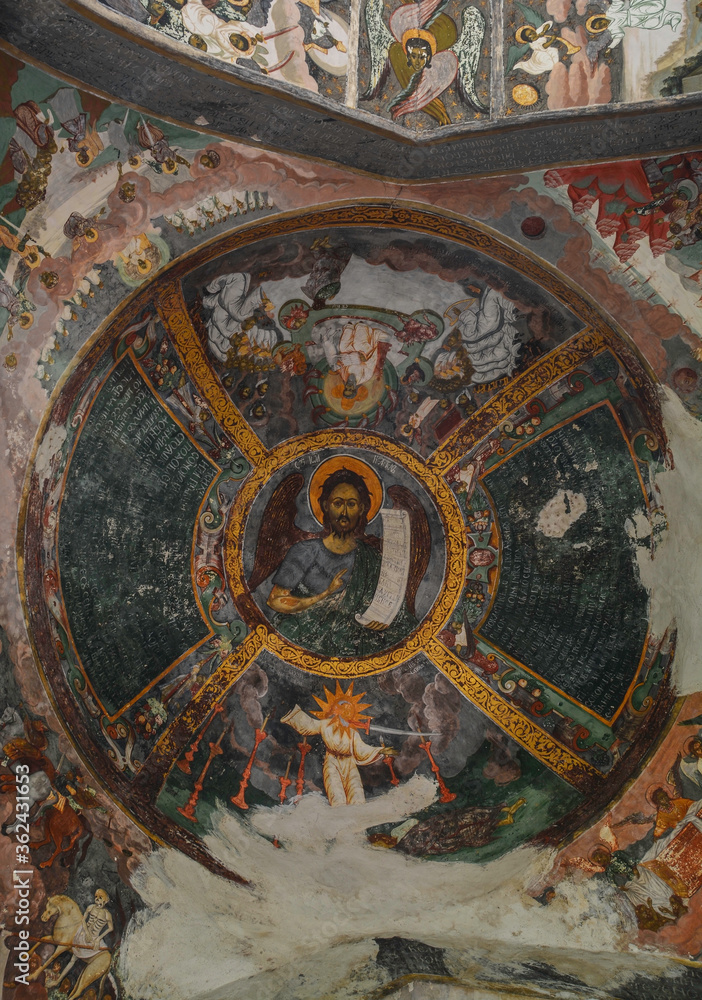 SUCEVITE MONASTERY, BUCOVINA, ROMANIA, EUROPE, SPRING 2018. Fresco paintings and portraits of saints with Byzantine influence inside the Orthodox monastery. Moldovan architectural style.