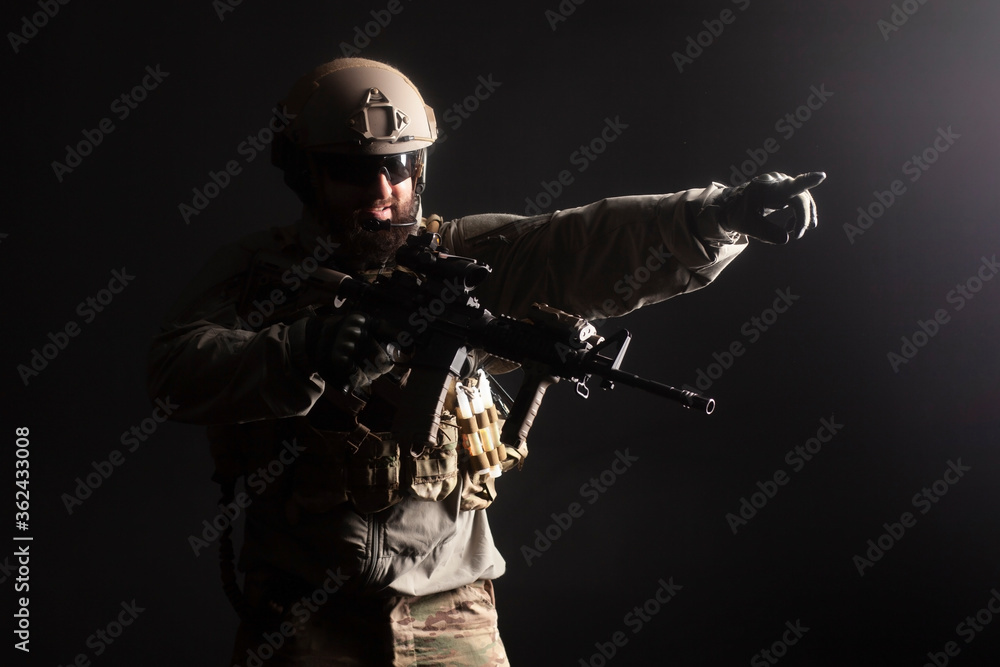 military special forces in uniform with weapons attack at night, elite troops, counter-terrorist against a dark background military special forces in uniform with weapons attack at night, elite troops, counter-terrorist against a dark background