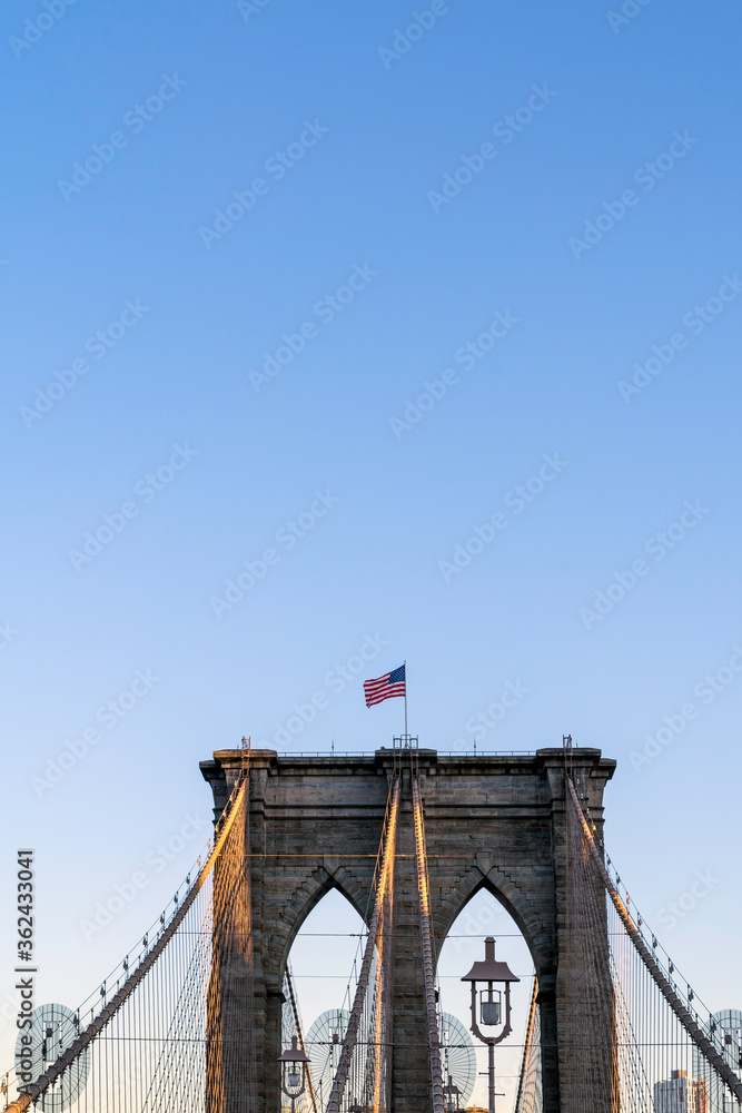 Fototapeta premium New York City, New York USA - September 21 2019 Brooklyn Bridge in New York city. Close up brownstone Brooklyn bridge.