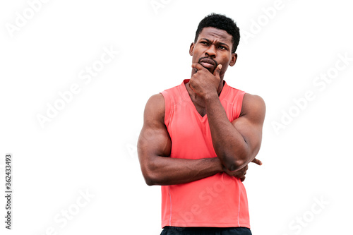 thoughtful african american guy thinks on a whitebackground, man wonders and ponders an idea