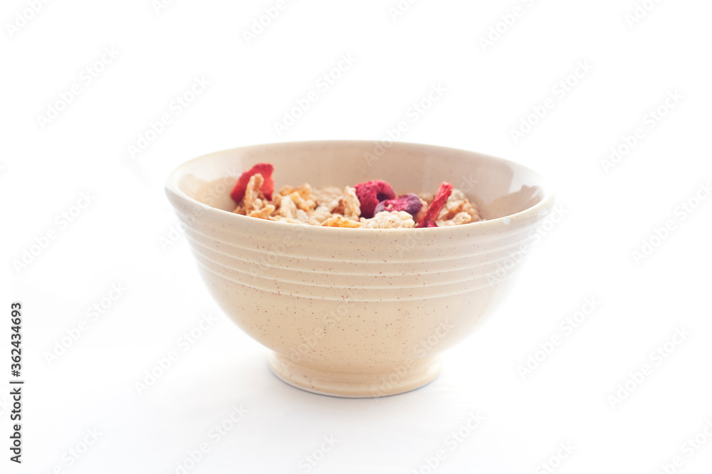 Bowl of cornflakes isolated on white Bowl of cornflakes isolated on white