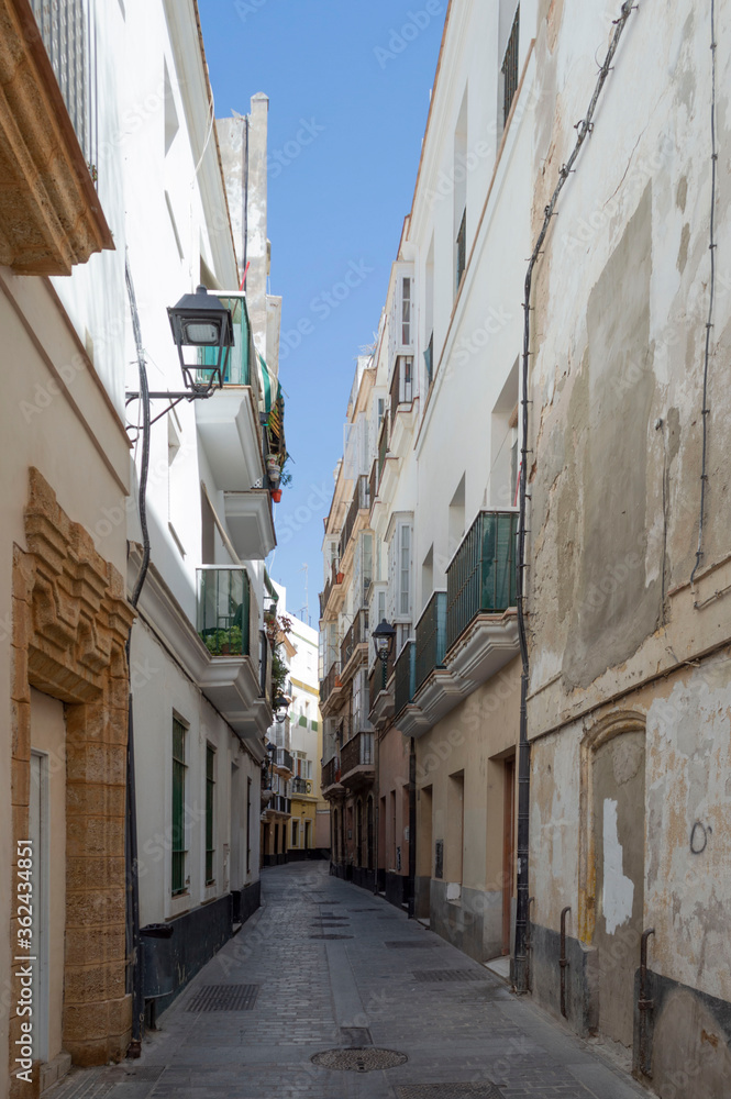Narrow street in the old town of Seville