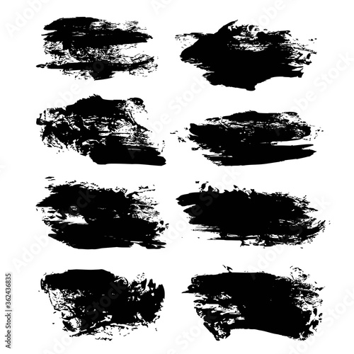 Big textured brush strokes different shapes isolated on a white background