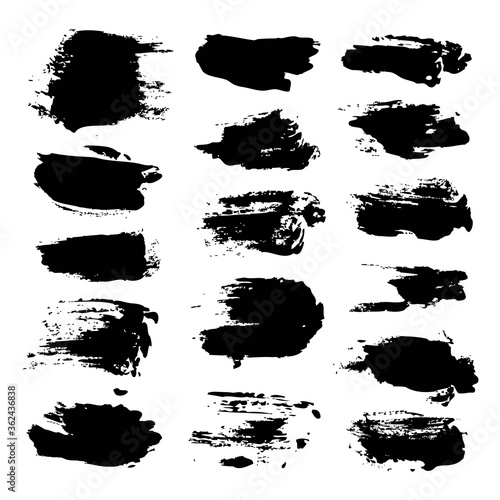 Black abstract brush strokes isolated on a white background
