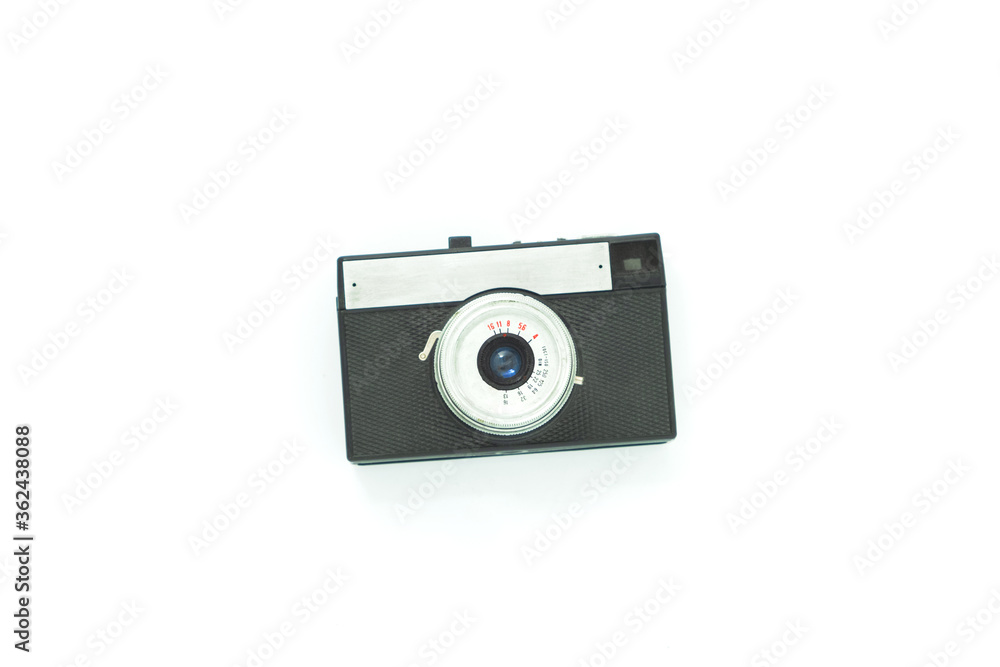 front view of old antique analog photo camera over white background