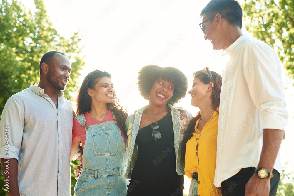 Group of happy friends having fun at barbecue party outdoor in house backyard. Young diverse culture people and friendship concept Group of happy friends having fun at barbecue party outdoor in house backyard. Young diverse culture people and friendship concept