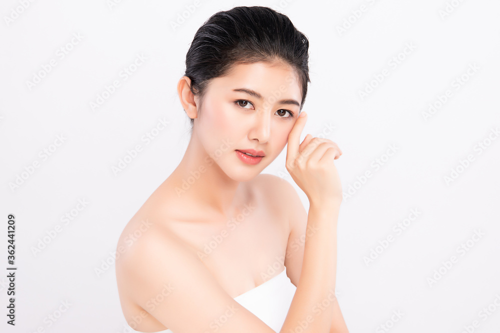 Close up Beautiful Young asian Woman touching her clean face with fresh Healthy Skin, on white background, Beauty Cosmetics and Facial treatment Concept Close up Beautiful Young asian Woman touching her clean face with fresh Healthy Skin, on white background, Beauty Cosmetics and Facial treatment Concept