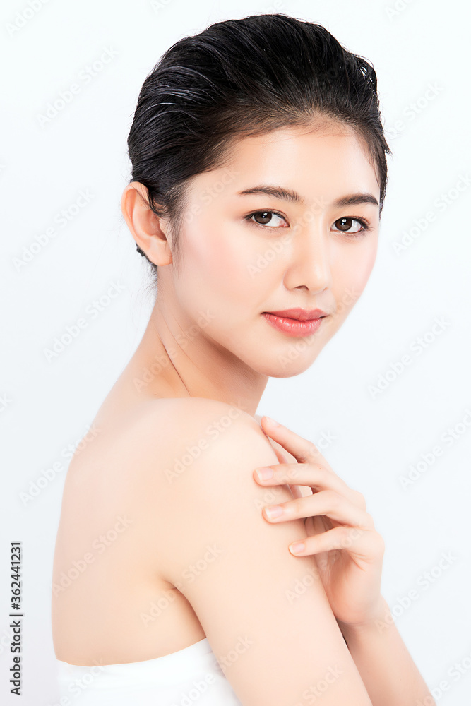 Side view Beautiful Young Asian Woman touching her body with fresh Healthy Skin, isolated on white background, Beauty Cosmetics and Facial treatment Concept Side view Beautiful Young Asian Woman touching her body with fresh Healthy Skin, isolated on white background, Beauty Cosmetics and Facial treatment Concept